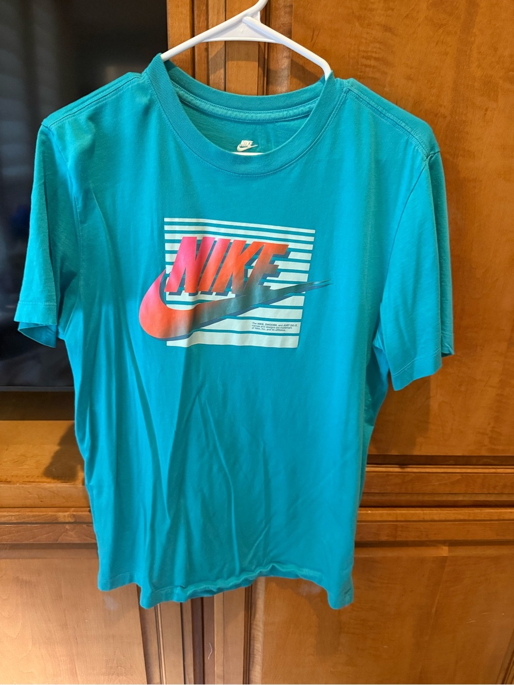 Nike Teal Short-Sleeve Tee with Pink-Orange Gradient Logo